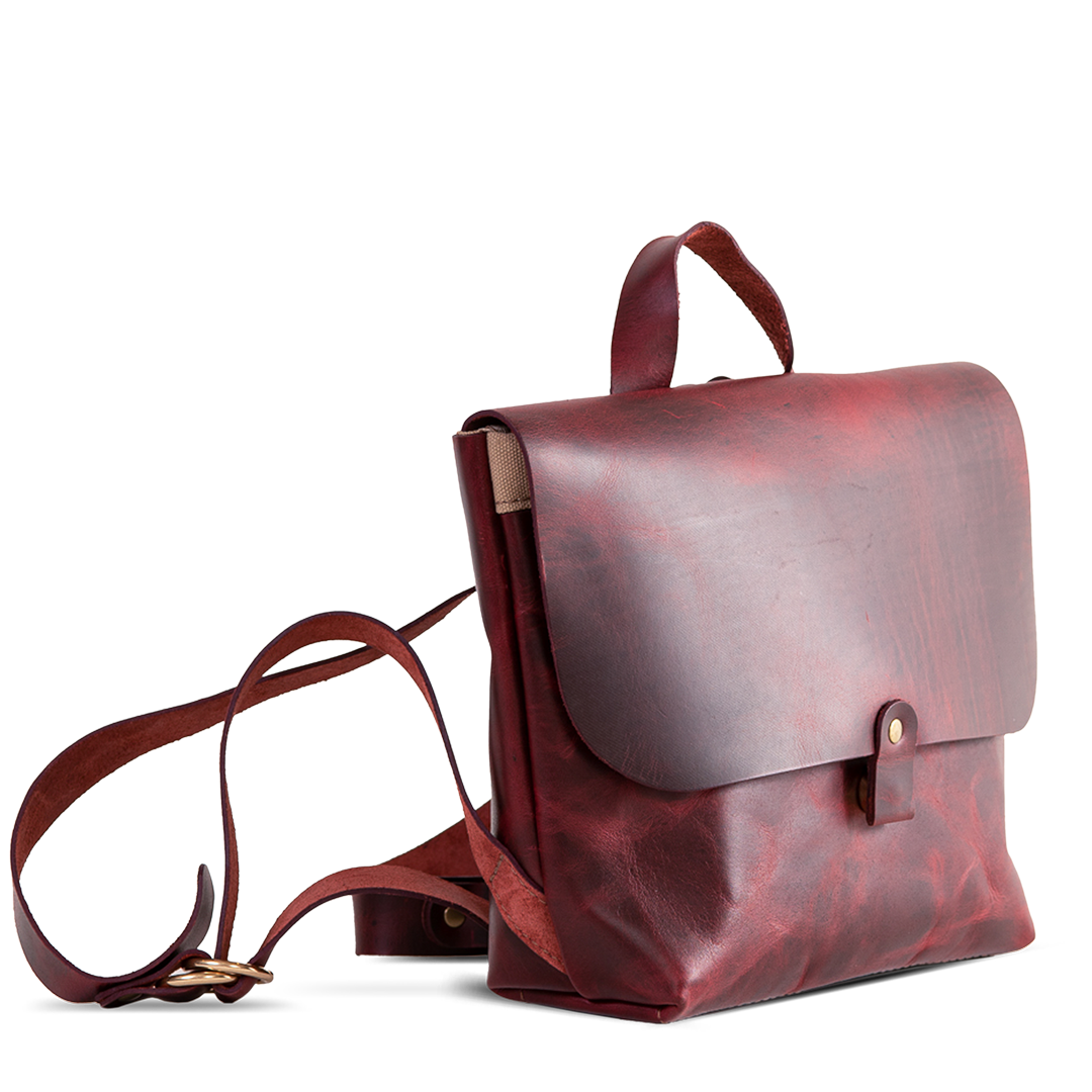 Leather satchel company sales backpack